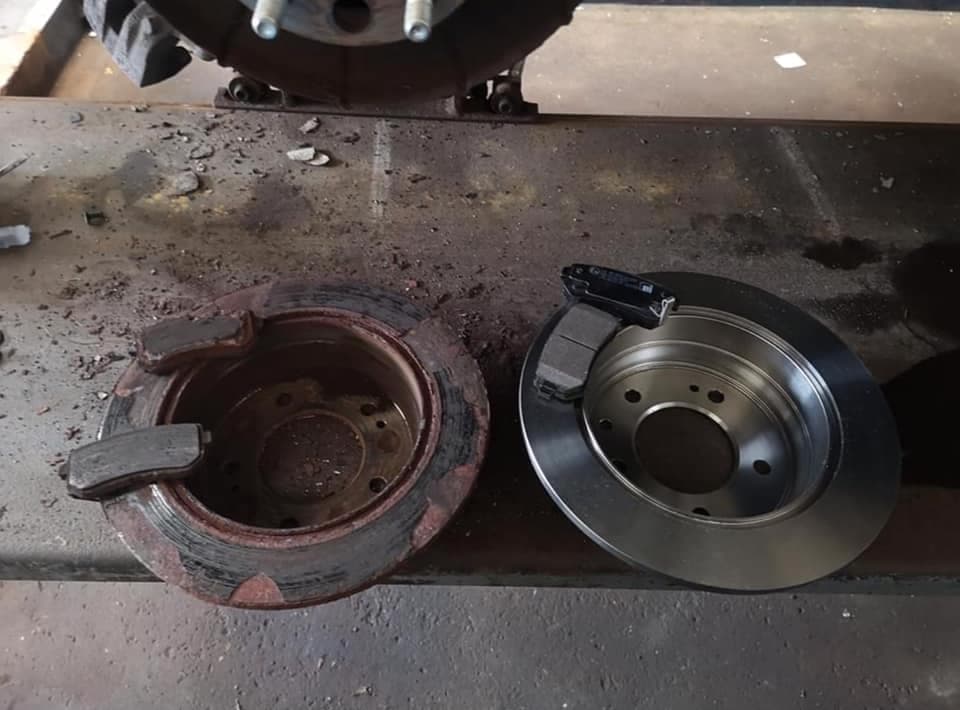 Mechanic working on a car